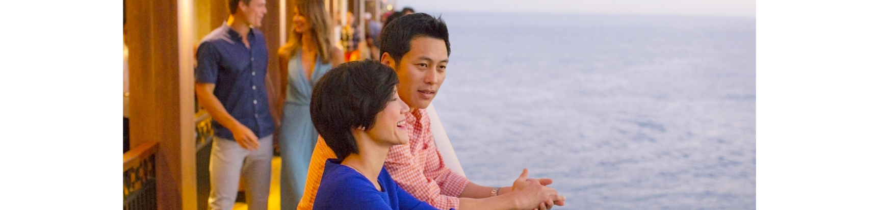 Cruise ship at scenic port with mountains